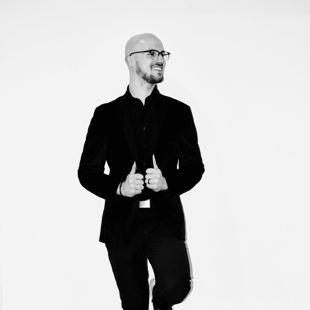 Portrait of Kyle Stearns, a professional stylist at Matthew Morris Salon, showcasing their expertise and style.