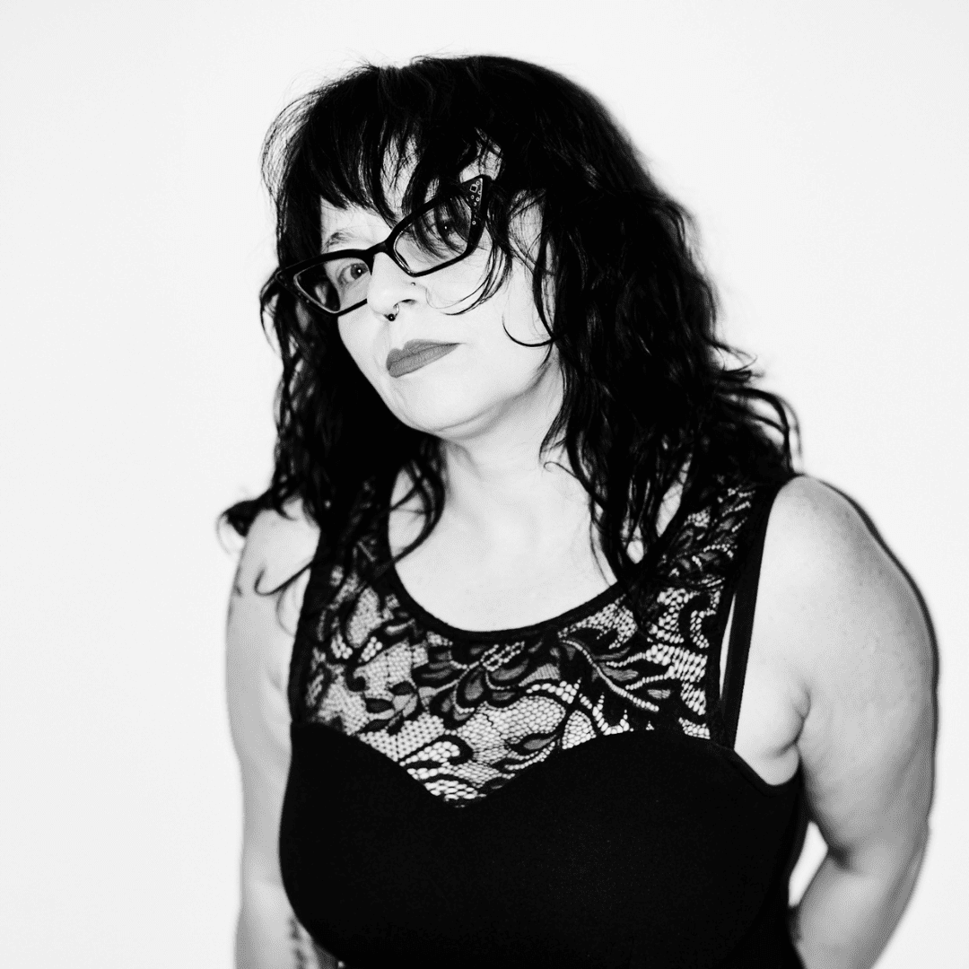 Portrait of Jennie Morris, a professional stylist at Matthew Morris Salon, showcasing their expertise and style.